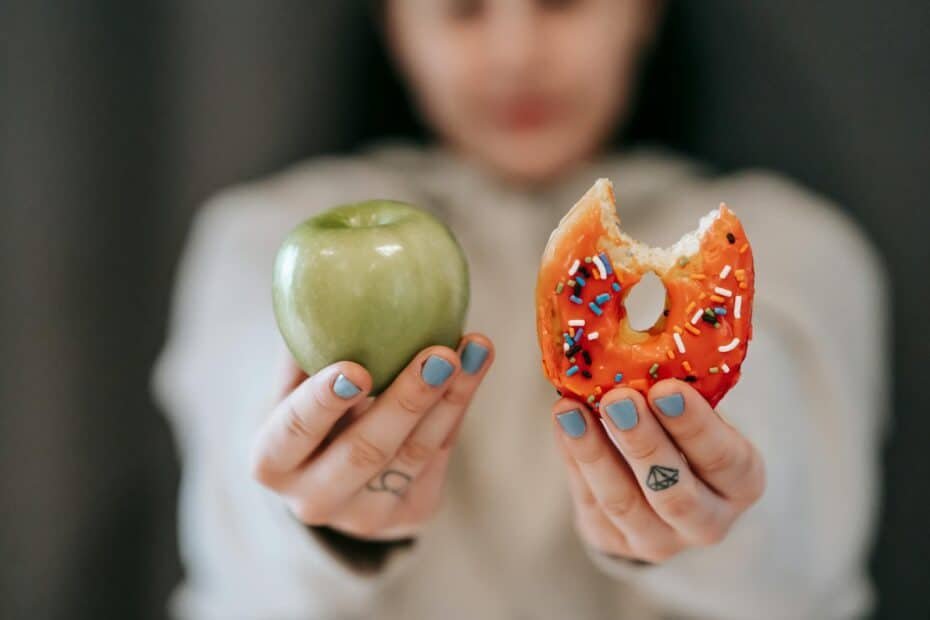 Healthy apple versus indulgent dessert: a visual representation of food choices and temptations.