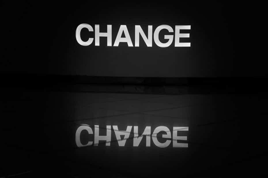 A black and white photo of the word change