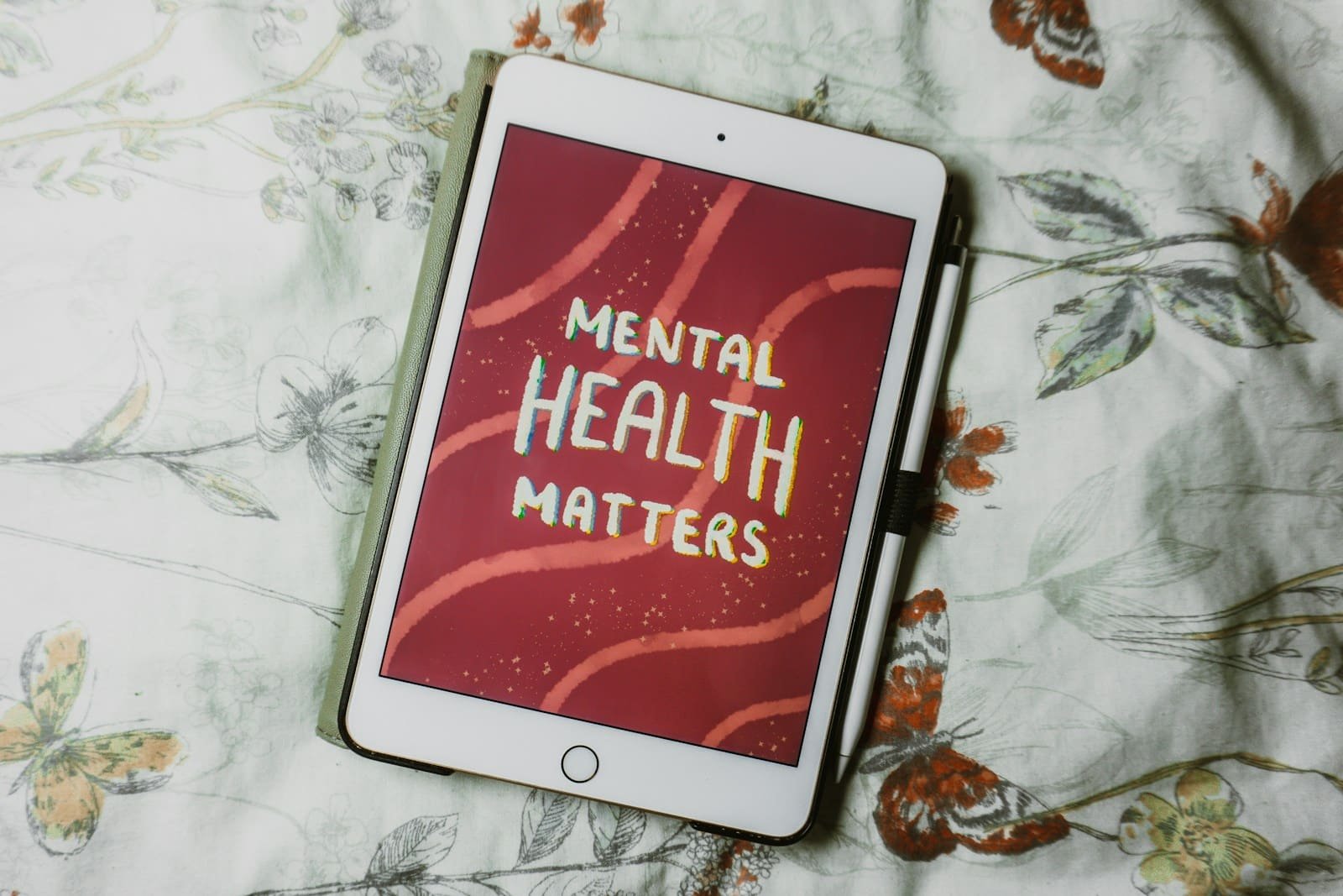 A tablet with the words mental health matters on it, mental health coaching