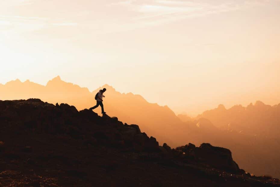 A person standing on top of a mountain