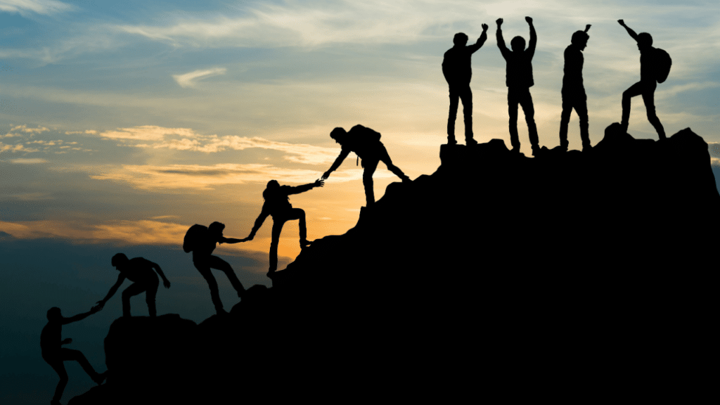 A group of people climbing a mountain