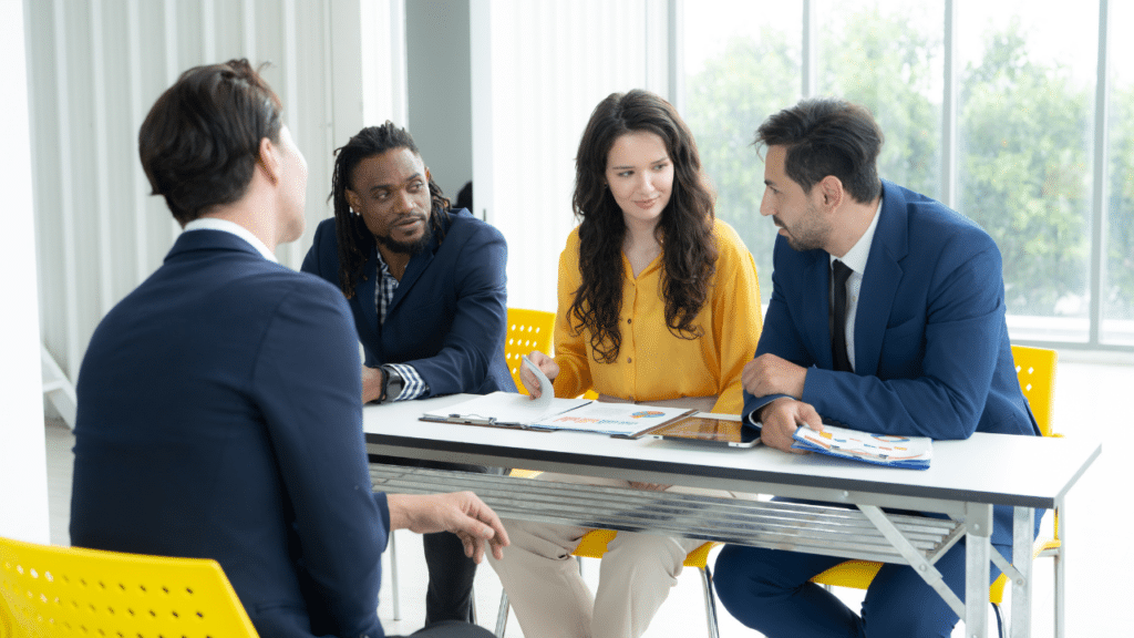 A group of people sitting at a table
