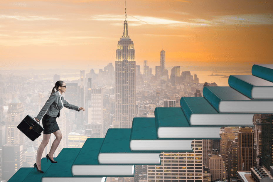 A woman walking up a stair of books